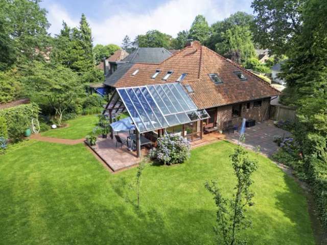 Einfamilienhaus mit Wintergarten und Garten am Waldrand in Herbrum