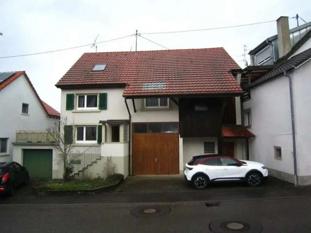 Wohnhaus mit Terrasse, Garage und Schopf