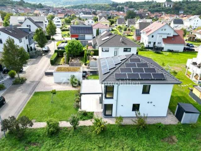 Modernes Einfamilienhaus mit Garten und Garage!